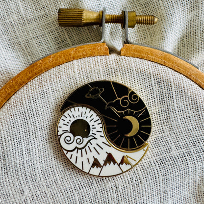 Night and Day Needle Minder Set on an embroidery hoop, sun and moon halves joined