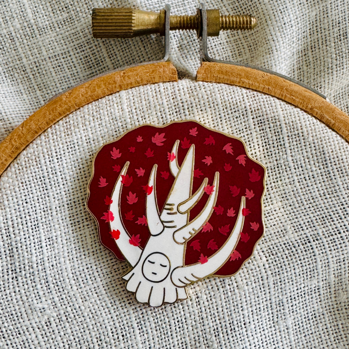 Weirwood Needle Minder on an embroidery hoop, red leaves and white trunk, gold finish