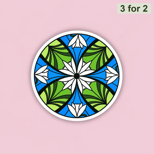 Elven Stained Glass Sticker, round clear sticker of green and blue stained glass with white flowers, held up to the sky, LOTR sticker