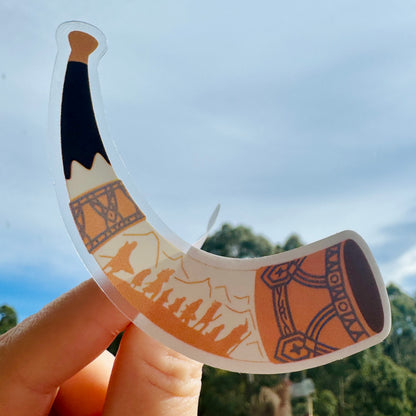 Horn of Gondor Sticker held up against the sky to show the clear vinyl, LOTR sticker