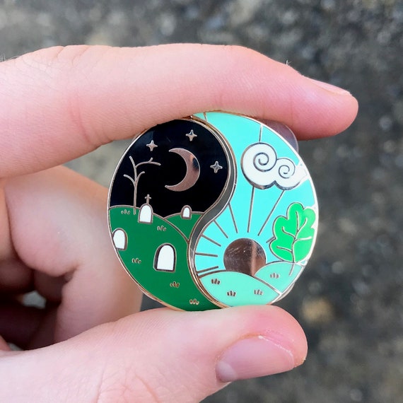 Life and Death Needle Minder Set joined into one circle, held in a hand