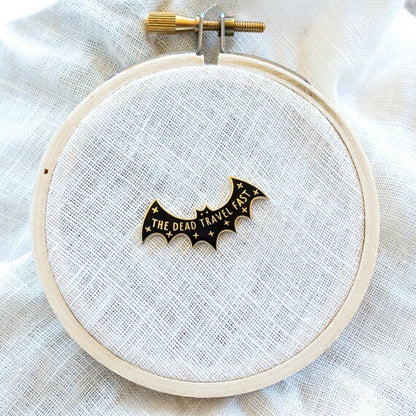 The Dead Travel Fast Needle Minder on white fabric in a hoop