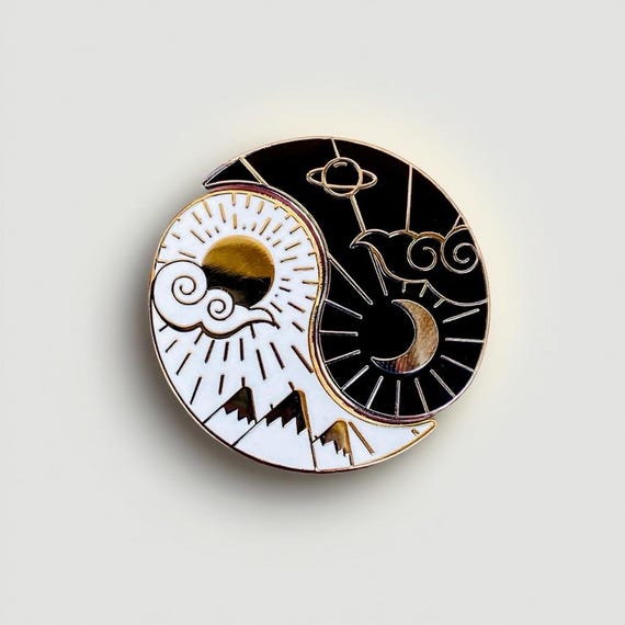 Night and Day Needle Minder Set, sun and moon yin yang halves joined, gold finish