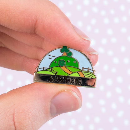 Bag End Needle Minder, gold finish enamel needle minder of Bag End with its name banner