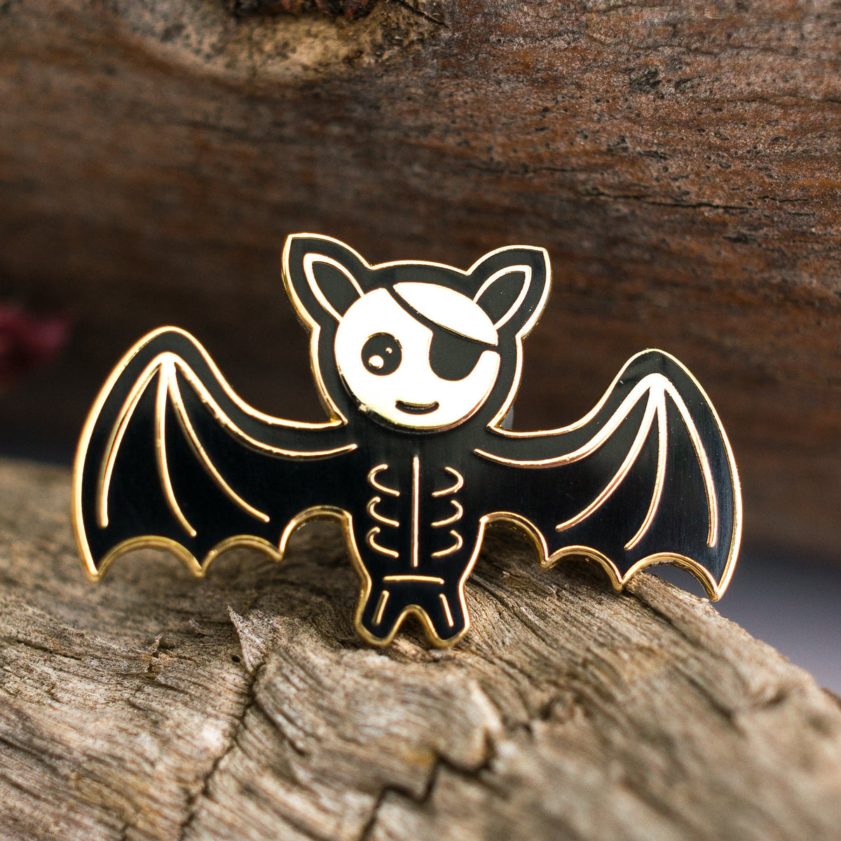Skeleton Bat enamel pin, gold pirate skeleton bat with an eyepatch