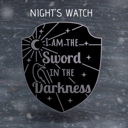Winter Watch Needle Minder, black shield needle minder reading I am the sword in the darkness