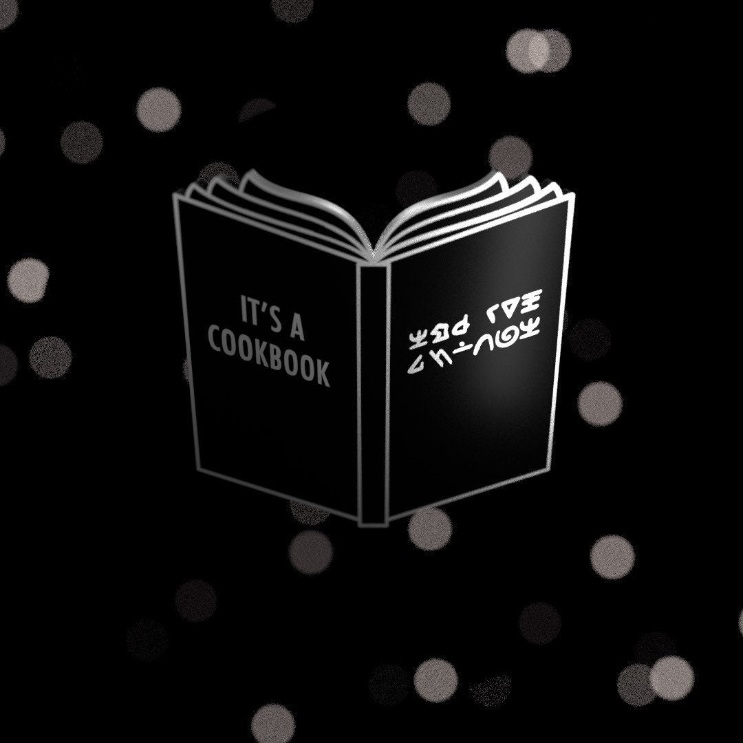It's a Cookbook enamel pin, black book with alien writing, silver plated, Second