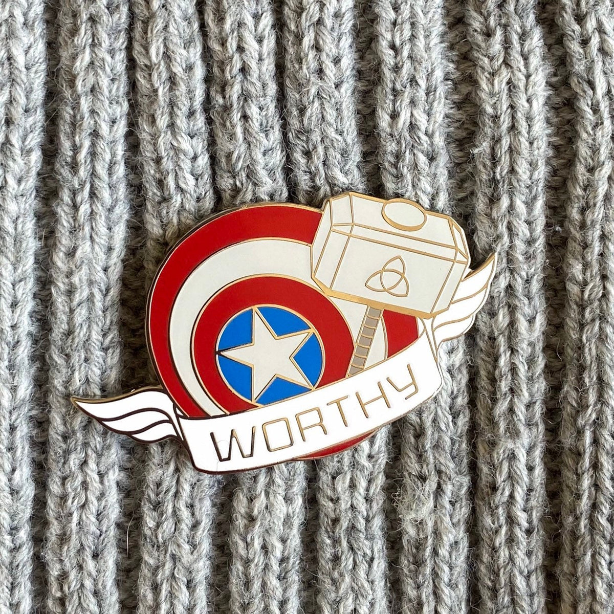 Worthy enamel pin
