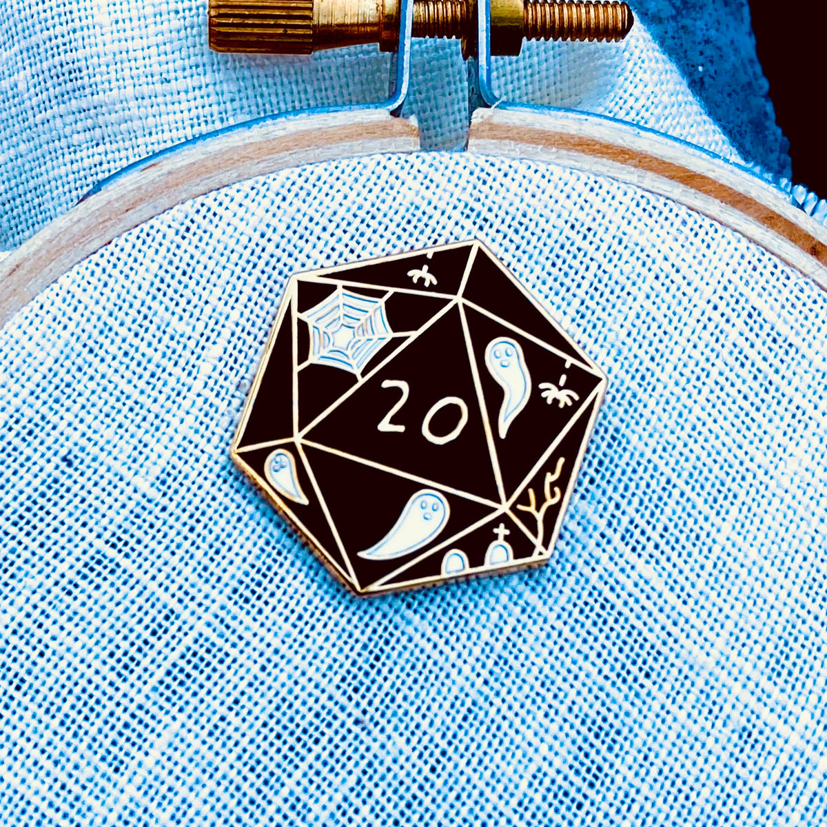 Spooky D20 Needle Minder, black enamel D20 dice needle minder with gold finish