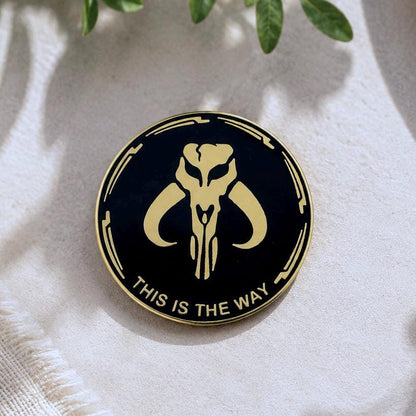 This is the Way enamel pin, gold Mythosaur skull on black, Mandalorian Star Wars pin