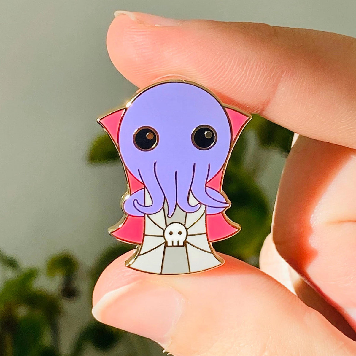 Kawaii brain-eater enamel pin, purple with a red cape