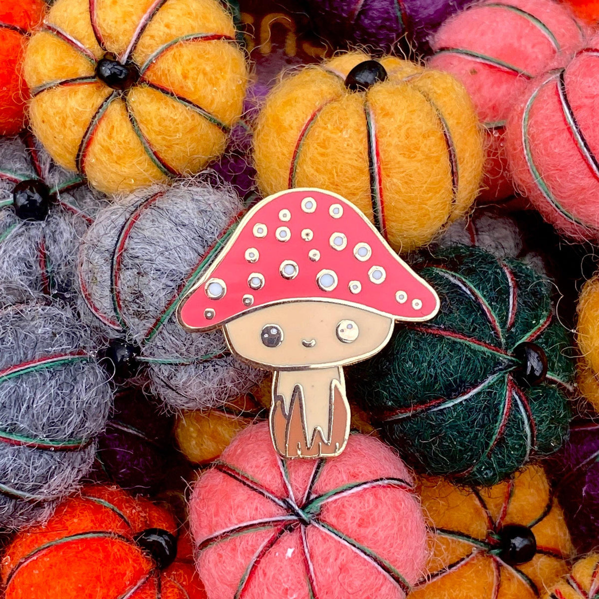 Maurice the Mushroom enamel pin, second view