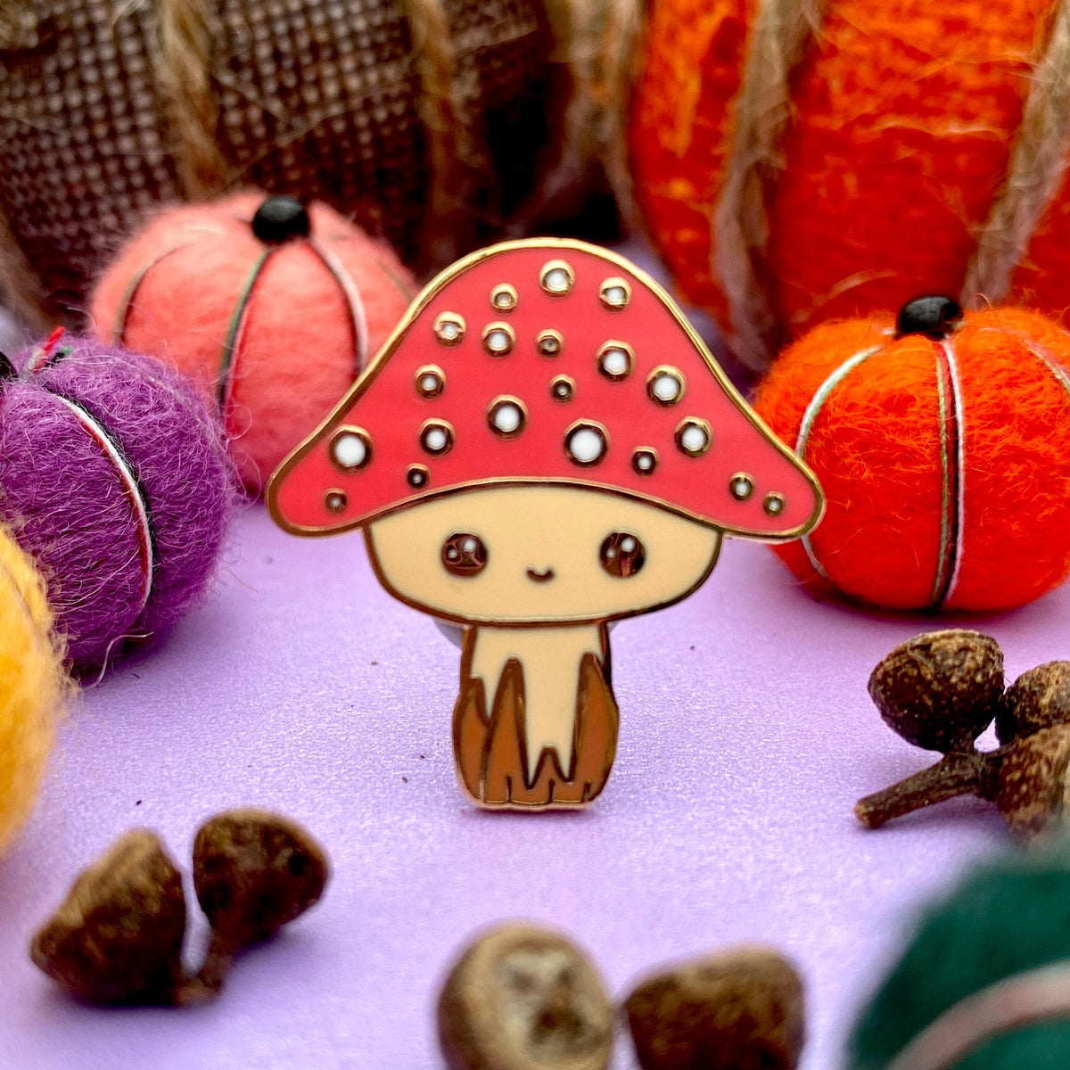 Maurice the Mushroom enamel pin, third view