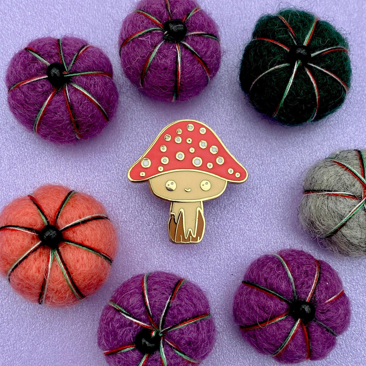 Maurice the Mushroom enamel pin, fourth view