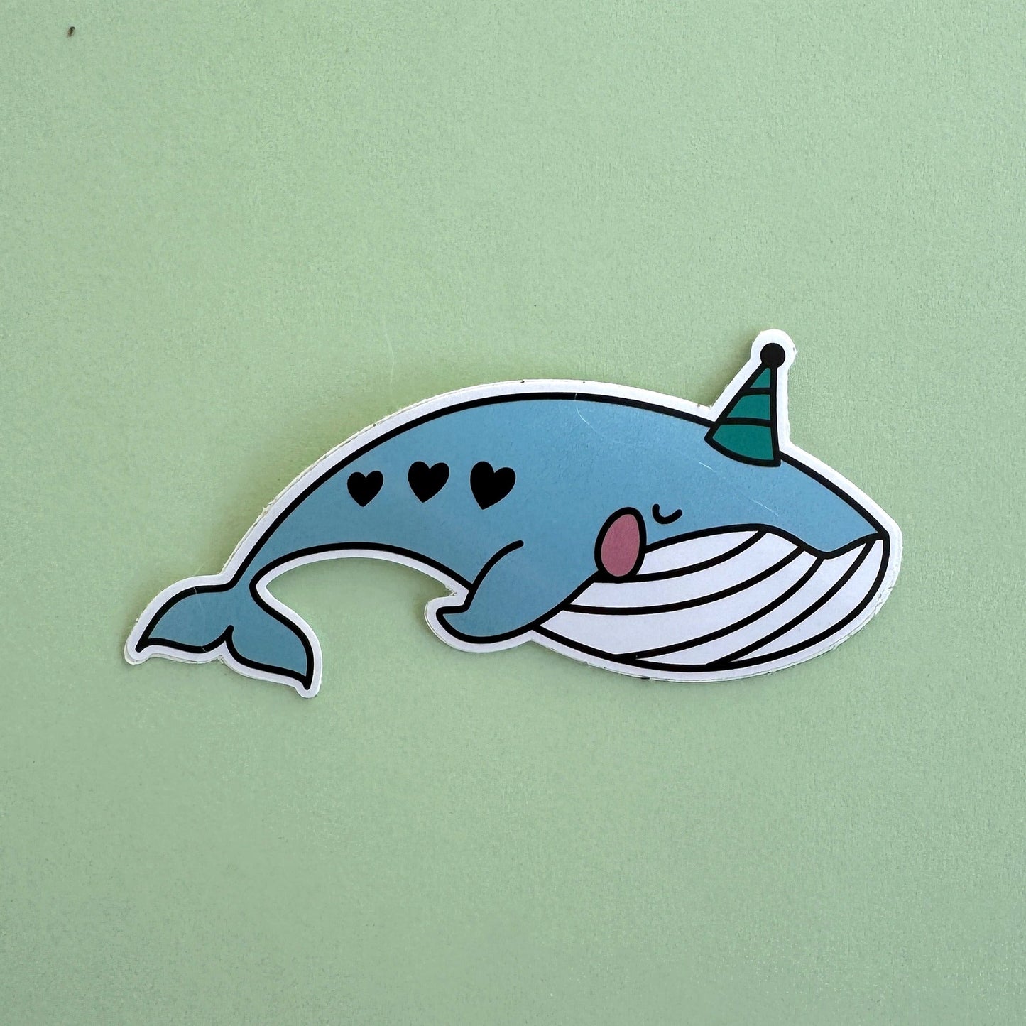 Party Whale sticker - kawaii whale with hearts on its side and party hat