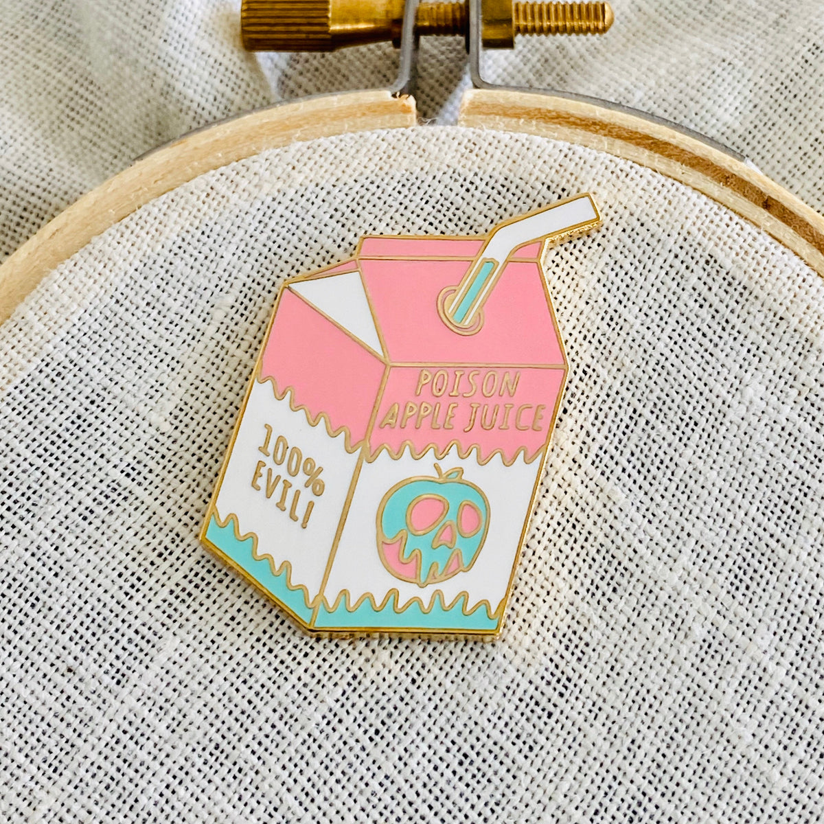 Poison apple juice needle minder, gold finish