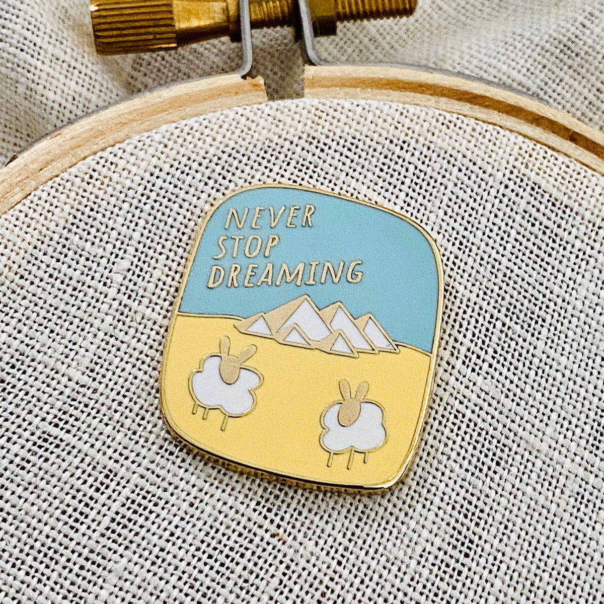 The Alchemist needle minder, gold finish