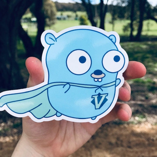 Vim Go Gopher sticker — Go gopher wearing a flowing cape with a V emblem, modal editing tribute